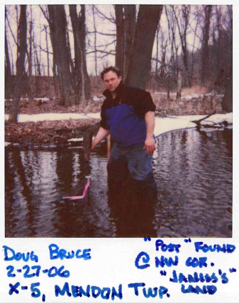 Doug Bruce standing in shallow water with bare trees in background, labeled with date 2-27-06 and location details.