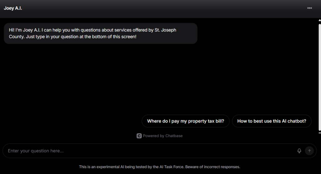 Joey A.I. chatbot interface for St. Joseph County services with input field and example questions displayed.
