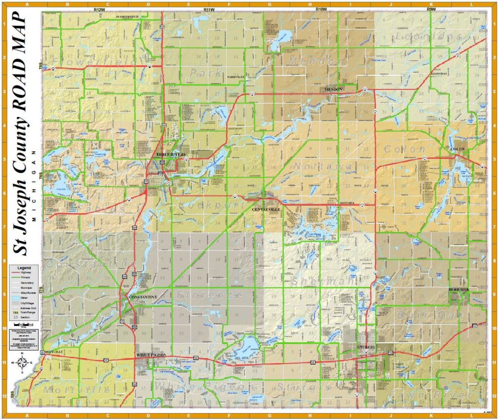 A comprehensive St. Joseph County Road Map showing the network of highways, primary roads, and secondary roads across all sixteen townships. The map features topographic shading, county water bodies in blue, and labeled municipal boundaries for cities and villages including Three Rivers, Sturgis, and Centreville.