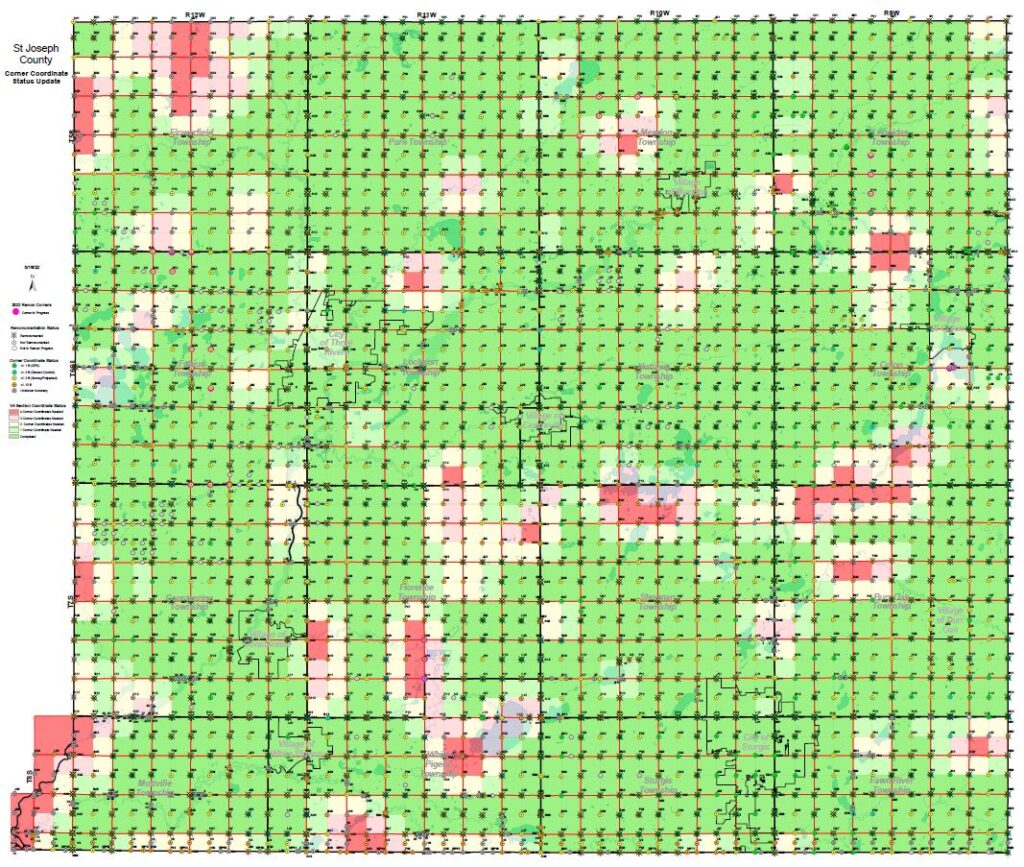 A county-wide grid map of St. Joseph County showing the status of section corner coordinates. The map is primarily green (completed), with scattered red and yellow blocks indicating areas where coordinates are still needed or in progress as of March 2022.